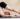 Mann in Unterhose bei einer Yoga Pose